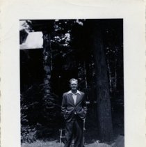 Portrait of Well-Dressed Man On His Lawn