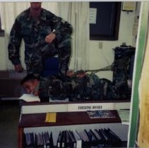 Lieutenant Millner Hog-Ties a Soldier in an Office