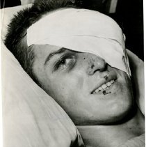 Pfc. Dennis M. Francis Smiles in his Hospital Bed at Fort Ord