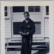 Private Jim Lercenio in his Robe and Slippers