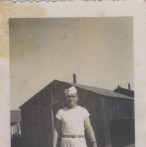 Army Cook Smokes Cigarette on a Military Base