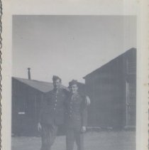 Two Soldiers Take Photo Together on a Military Base