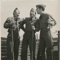 Principal Actors in the "Wizard of Ord" Rehearse a Song at Fort Ord