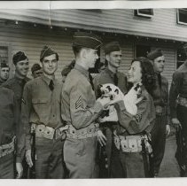 Michele Morgan Presents New Mascots to 7th Division at Fort Ord