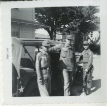Privates Lean Against a Jeep Outside of Barracks at Fort Ord