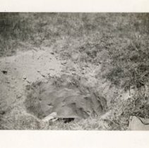 Soldier Hidden in a Foxhole at Fort Ord