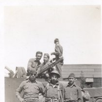 Crew of Soliders Standing with their Half-Track
