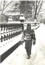 Boy walking in snow on Monum.