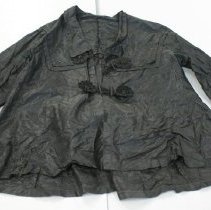 Jacket is blacker than appears in photo.