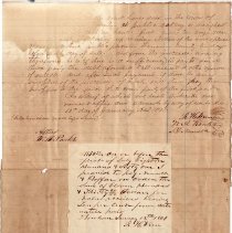 Warranty deed for the sale of two male slaves in Bonham dated 1-12-1861.  P