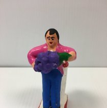 Ofrenda Candlestick, Man with Grapes