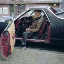 Man in Car, Powell Street by Stephen Waddell