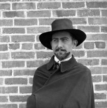 Actor posing in costume