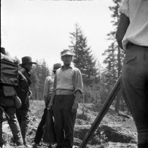 Film crew members and actors preparing for scene