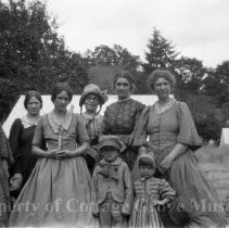 Group portrait of women and children extras