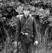 Actor posing in soldier costume