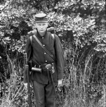 Actor posing in soldier costume