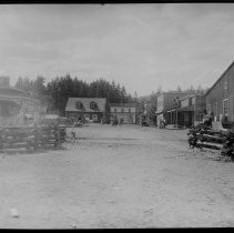 Cast on town set awaiting filming.