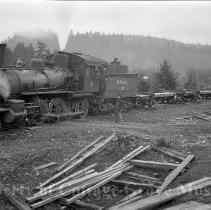 Engine # 8 with flat cars.