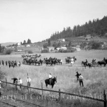 Troops and film crew on field set