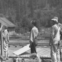 Buster Keaton gving direction with crew on set
