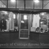 Shop window display at 527 Main Street