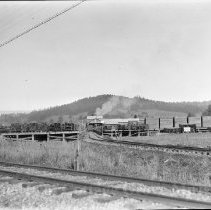 Lumber mill with railroad tracks