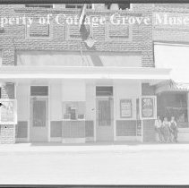 Arcade building  with dentist, movie theater and Quality Market.