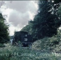 Blue Goose locomotive approaching depot