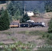 Blue Goose en route with house in background