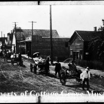 Parade of horse-drawn wagons on Main Street