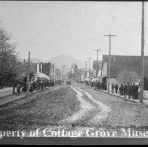Crowd walking along Main Street.