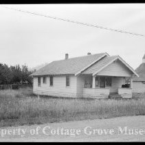 House at 230 N. I St. with Catholic Church in background