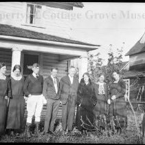 The William J. and Ellen White Family in front of house