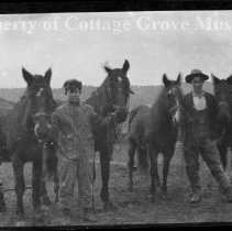Man and Boy with Horses