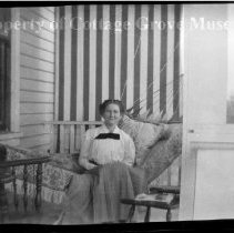 Unidentified woman posing on hammock