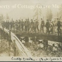 Actor soldiers marching along railroad trellis