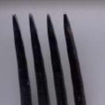 Silver dinner fork with plain "P" engraved in handle