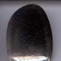 Silver serving spoon with "AMWP" engraved in handle