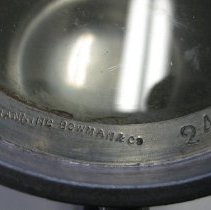 Manufacturer's information engraved on the bottom rim