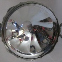 Top of silver plated tureen showing knob finial