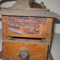 Close up of front of coffee grinder/mill