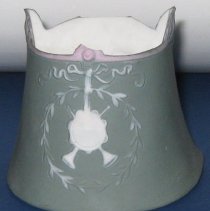 Vase decorated in white relief in the style of Wedgewood