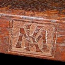 Engraving on treadle spinning wheel for flax