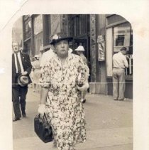 Woman on a city sidewalk