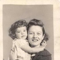 Woman holding a girl