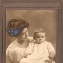 Woman holding a young child