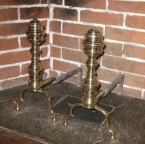 Brass andirons with turned columns and ball feet