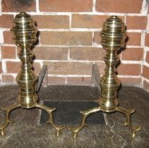 Brass andirons with turned columns and ball feet