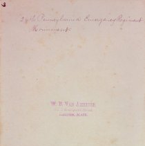 Writing and stamp on the back of the photograph